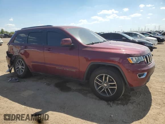 2018 Jeep Grand Cherokee Altitude with VIN 1C4RJFAGXJC492779, listed as a Copart auction lot 70945455 with 84,637 mi miles and Salvage title. Bid and sale history available at DreamBid. Image 4.