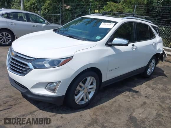 2018 Chevrolet Equinox Premier with VIN 2GNAXWEX8J6134036, listed as a IAAI auction lot 43130152 with 122,458 mi miles and . Bid and sale history available at DreamBid. Image 18.