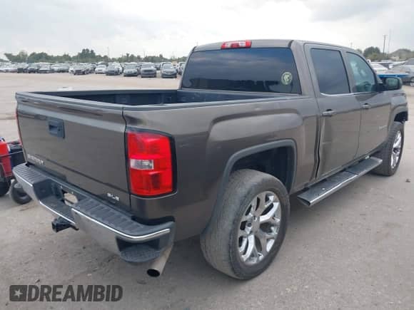 2014 GMC Sierra 1500 SLE with VIN 3GTU1UEC2EG351004, listed as a IAAI auction lot 43540049 with 196,197 mi miles and . Bid and sale history available at DreamBid. Image 4.
