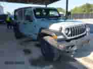 2024 Jeep Wrangler Willys with VIN 1C4PJXDN7RW268872, listed as a IAAI auction lot 43002134 with 22,987 mi miles and . Bid and sale history available at DreamBid. Image 1.