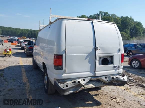 2002 Ford Econoline Cargo Commercial with VIN 1FTSE34L12HB06624, listed as a IAAI auction lot 43004633 with 199,587 mi miles and . Bid and sale history available at DreamBid. Image 3.