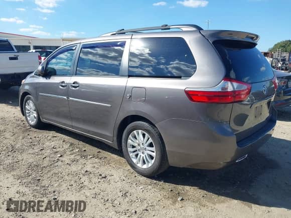 2015 Toyota Sienna XLE z VIN 5TDYK3DCXFS655064, wystawiony jako IAAI lot #43445181 z przebiegiem 235 268 mil mil oraz . Historia ofert i sprzedaży dostępna na DreamBid. Obrazek 3.