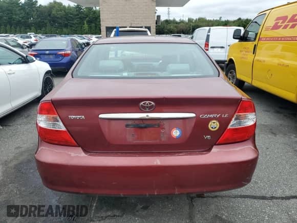 2002 Toyota Camry XLE z VIN 4T1BF32K02U023924, wystawiony jako Copart lot #80752185 z przebiegiem 117 715 mil mil oraz Nie do naprawy • Non repairable. Historia ofert i sprzedaży dostępna na DreamBid. Obrazek 6.