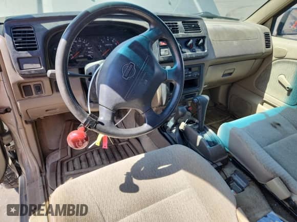 2000 Nissan Frontier XE с VIN 1N6ED26Y5YC419486, выставлен на аукционе Copart как лот 71229465 с пробегом 11 939 миль миль и Списание • Salvage title. История ставок и продаж доступна на DreamBid. Изображение 8.
