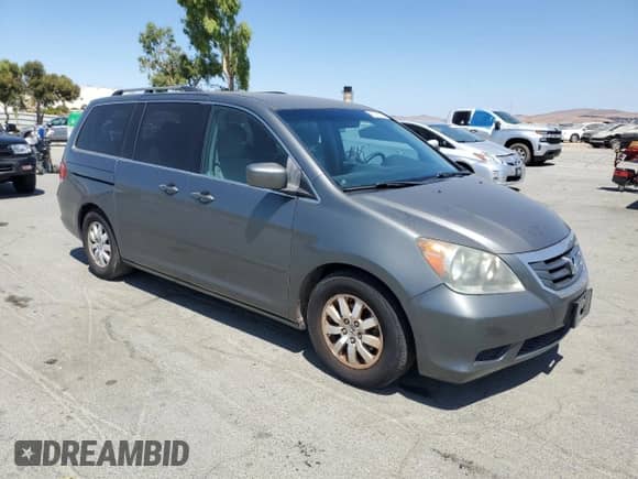 2008 Honda Odyssey EX z VIN 5FNRL38478B108233, wystawiony jako Copart lot #63931825 z przebiegiem 209 095 mil mil oraz Czysty tytuł • Clean title. Historia ofert i sprzedaży dostępna na DreamBid. Obrazek 4.