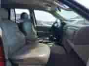 2002 Jeep Grand Cherokee Sport with VIN 1J4GW38S72C276689, listed as a IAAI auction lot 42586977 with 360,258 mi miles and . Bid and sale history available at DreamBid. Image 5.