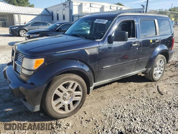 2011 Dodge Nitro Heat with VIN 1D4PT4GK2BW528503, listed as a Copart auction lot 90863585 with 121,569 mi miles and Clean title. Bid and sale history available at DreamBid. Image 1.