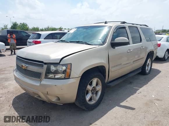 2007 Chevrolet Suburban LTZ z VIN 3GNFC16077G143345, wystawiony jako IAAI lot #42073956 z przebiegiem Nie podano mil oraz . Historia ofert i sprzedaży dostępna na DreamBid. Obrazek 2.
