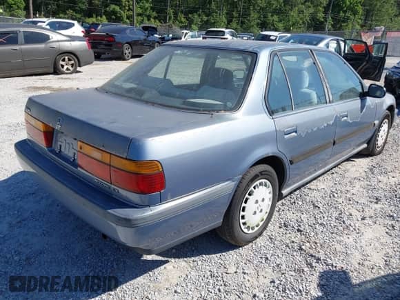 1990 Honda Accord with VIN 1HGCB7653LA065508, listed as a IAAI auction lot 42141552 with 287,026 mi miles and . Bid and sale history available at DreamBid. Image 4.