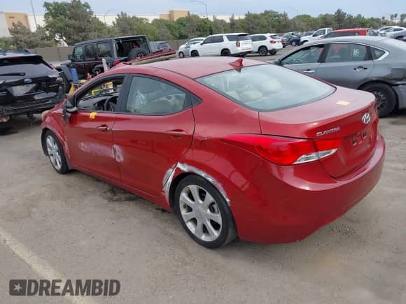 2013 Hyundai Elantra GLS with VIN KMHDH4AE0DU784511, listed as a IAAI auction lot 43083210 with 243,142 mi miles and . Bid and sale history available at DreamBid. Image 3.