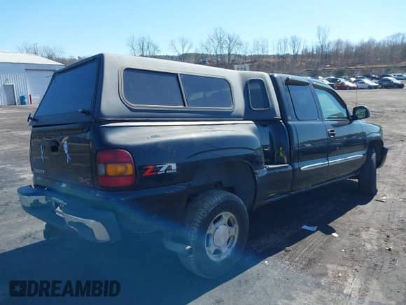 2003 GMC Sierra 1500 SLT z VIN 1GTEK19TX3Z135909, wystawiony jako IAAI lot #41821797 z przebiegiem 48 328 mil mil oraz . Historia ofert i sprzedaży dostępna na DreamBid. Obrazek 4.