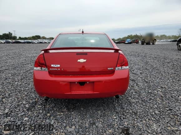 2012 Chevrolet Impala LT Retail with VIN 2G1WB5E36C1303371, listed as a Copart auction lot 82142965 with 125,867 mi miles and Salvage title. Bid and sale history available at DreamBid. Image 6.