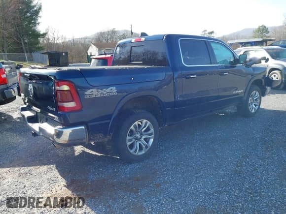 2020 Ram 1500 Longhorn with VIN 1C6SRFKT5LN185329, listed as a IAAI auction lot 41709711 with 78,586 mi miles and . Bid and sale history available at DreamBid. Image 4.