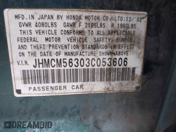 2003 Honda Accord LX with VIN JHMCM56303C053606, listed as a IAAI auction lot 43153633 with Not provided miles and . Bid and sale history available at DreamBid. Image 9.