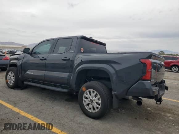 2024 Toyota Tacoma SR5 with VIN 3TMLB5JN0RM071045, listed as a Copart auction lot 70163855 with 8,616 mi miles and Salvage title. Bid and sale history available at DreamBid. Image 2.