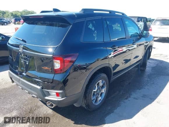 2023 Honda Passport TrailSport с VIN 5FNYF8H64PB033801, выставлен на аукционе IAAI как лот 43140933 с пробегом 38 095 миль миль и . История ставок и продаж доступна на DreamBid. Изображение 4.