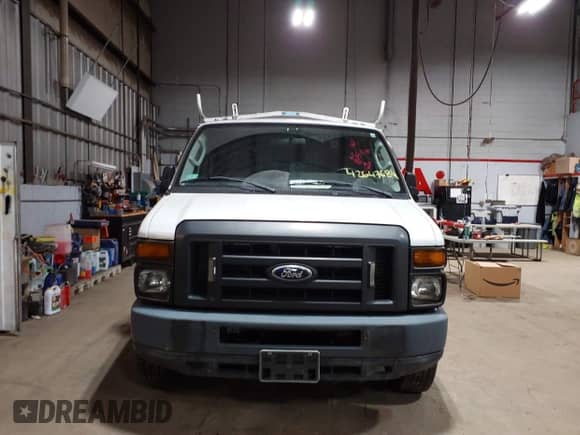 2014 Ford Econoline Cargo Commercial with VIN 1FTNE2EL6EDB13764, listed as a IAAI auction lot 42647684 with 99,876 mi miles and . Bid and sale history available at DreamBid. Image 12.