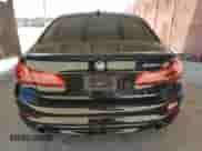 2020 BMW 5 Series 530e with VIN WBAJA9C01LCD69759, listed as a Copart auction lot 58271025 with 56,732 mi miles and Salvage title. Bid and sale history available at DreamBid. Image 6.