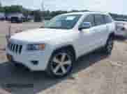 2014 Jeep Grand Cherokee Limited z VIN 1C4RJFBG8EC246639, wystawiony jako IAAI lot #42811330 z przebiegiem 129 719 mil mil oraz . Historia ofert i sprzedaży dostępna na DreamBid. Obrazek 16.