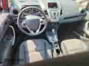 2012 Ford Fiesta SE z VIN 3FADP4BJ0CM126537, wystawiony jako Copart lot #70911825 z przebiegiem 130 743 mil mil oraz Szkoda całkowita • Salvage title. Historia ofert i sprzedaży dostępna na DreamBid. Obrazek 8.