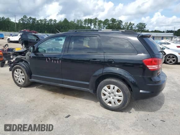 2017 Dodge Journey SE with VIN 3C4PDCAB7HT707471, listed as a Copart auction lot 68506865 with 86,385 mi miles and Salvage title. Bid and sale history available at DreamBid. Image 2.