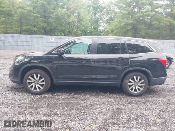 2022 Honda Pilot EX-L with VIN 5FNYF6H55NB022346, listed as a IAAI auction lot 42645712 with 146,154 mi miles and . Bid and sale history available at DreamBid. Image 14.