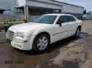 2005 Chrysler 300 300C AWD with VIN 2C3AK63H55H639159, listed as a Copart auction lot 51738805 with 192,883 mi miles and Salvage title. Bid and sale history available at DreamBid. Image 1.