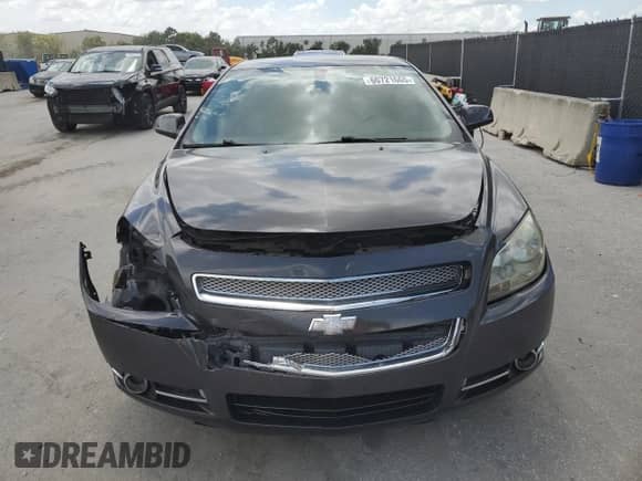 2010 Chevrolet Malibu LTZ with VIN 1G1ZE5E75A4133481, listed as a Copart auction lot 60721665 with 157,868 mi miles and Salvage title. Bid and sale history available at DreamBid. Image 5.