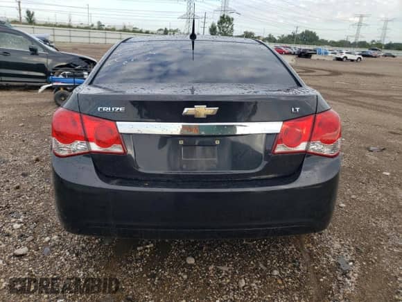 2014 Chevrolet Cruze 1LT с VIN 1G1PC5SB7E7188847, выставлен на аукционе Copart как лот 70160885 с пробегом 151 251 миль миль и Списание • Salvage title. История ставок и продаж доступна на DreamBid. Изображение 6.