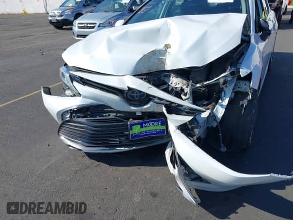 2020 Toyota Camry Hybrid XLE z VIN 4T1F31AK1LU541672, wystawiony jako IAAI lot #43125531 z przebiegiem 207 911 mil mil oraz . Historia ofert i sprzedaży dostępna na DreamBid. Obrazek 6.