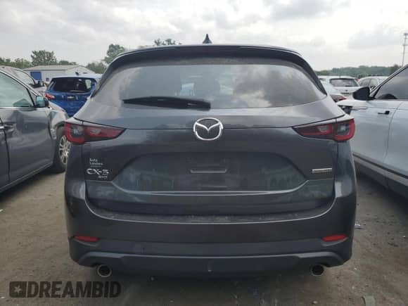 2022 Mazda CX-5 S Select z VIN JM3KFBBM4N0561612, wystawiony jako Copart lot #67456505 z przebiegiem 54 362 mil mil oraz Szkoda całkowita • Salvage title. Historia ofert i sprzedaży dostępna na DreamBid. Obrazek 6.