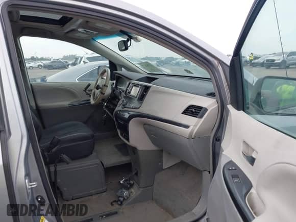 2014 Toyota Sienna SE with VIN 5TDXK3DC6ES421515, listed as a IAAI auction lot 43102179 with 63,756 mi miles and . Bid and sale history available at DreamBid. Image 5.