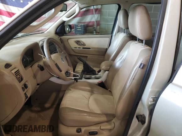 2007 Mercury Mariner Premier with VIN 4M2CU97107KJ05778, listed as a Copart auction lot 60433475 with 218,344 mi miles and Salvage title. Bid and sale history available at DreamBid. Image 7.