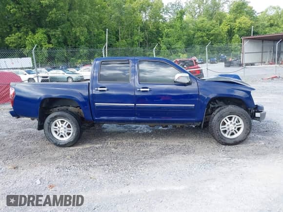 2011 Chevrolet Colorado 1LT z VIN 1GCHTCFE5B8124302, wystawiony jako IAAI lot #42494908 z przebiegiem 121 194 mil mil oraz . Historia ofert i sprzedaży dostępna na DreamBid. Obrazek 13.