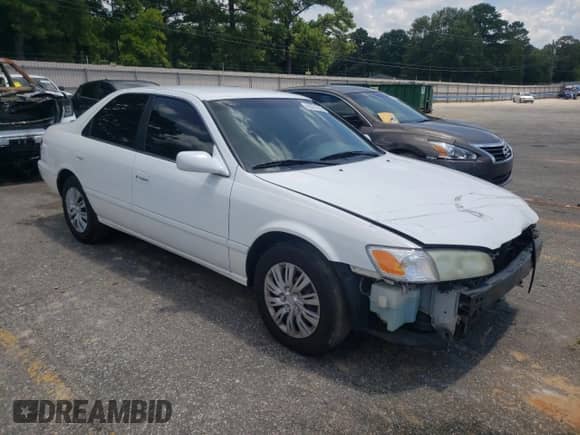 2001 Toyota Camry LE with VIN JT2BF22K110336056, listed as a Copart auction lot 65701515 with 216,284 mi miles and Salvage title. Bid and sale history available at DreamBid. Image 4.
