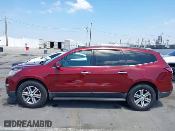 2015 Chevrolet Traverse LT with VIN 1GNKVHKD7FJ343603, listed as a IAAI auction lot 42990415 with 94,960 mi miles and . Bid and sale history available at DreamBid. Image 14.