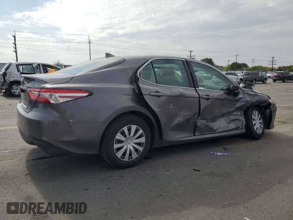 2019 Toyota Camry Hybrid LE с VIN 4T1B31HK3KU006667, выставлен на аукционе Copart как лот 80162455 с пробегом 81 491 миль миль и Списание • Salvage title. История ставок и продаж доступна на DreamBid. Изображение 3.