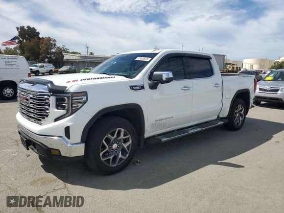 2022 GMC Sierra 1500 SLT with VIN 3GTUUDET9NG645703, listed as a Copart auction lot 52802575 with 69,811 mi miles and Salvage title. Bid and sale history available at DreamBid. Image 1.