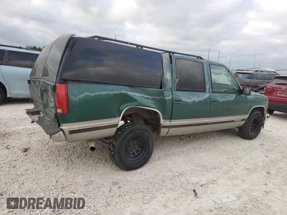 1999 Chevrolet Suburban с VIN 1GNEC16R6XJ415036, выставлен на аукционе Copart как лот 53565525 с пробегом 80 946 миль миль и Списание • Salvage title. История ставок и продаж доступна на DreamBid. Изображение 3.