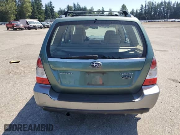 2007 Subaru Forester X L.L. Bean with VIN JF1SG676X7H747088, listed as a Copart auction lot 62539065 with 125,677 mi miles and Salvage title. Bid and sale history available at DreamBid. Image 6.