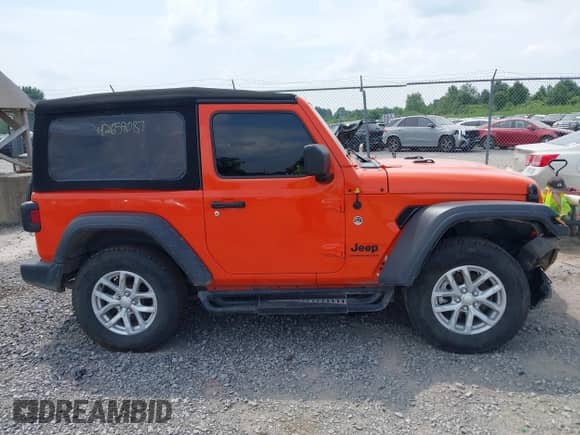2023 Jeep Wrangler Sport with VIN 1C4HJXAG1PW692362, listed as a IAAI auction lot 42659087 with 52,179 mi miles and . Bid and sale history available at DreamBid. Image 13.