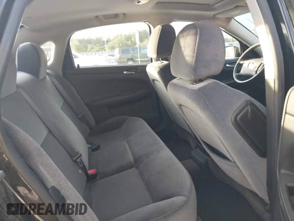 2014 Chevrolet Impala LT with VIN 2G1WB5E33E1155991, listed as a IAAI auction lot 43418771 with 133,404 mi miles and . Bid and sale history available at DreamBid. Image 8.