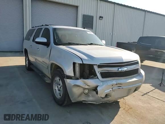 2011 Chevrolet Suburban LT с VIN 1GNSCJE09BR121047, выставлен на аукционе Copart как лот 71432645 с пробегом 188 387 миль миль и Списание • Salvage title. История ставок и продаж доступна на DreamBid. Изображение 13.