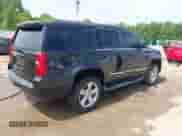 2016 Chevrolet Tahoe LT with VIN 1GNSKBKC2GR140991, listed as a IAAI auction lot 42469765 with 240,809 mi miles and . Bid and sale history available at DreamBid. Image 4.