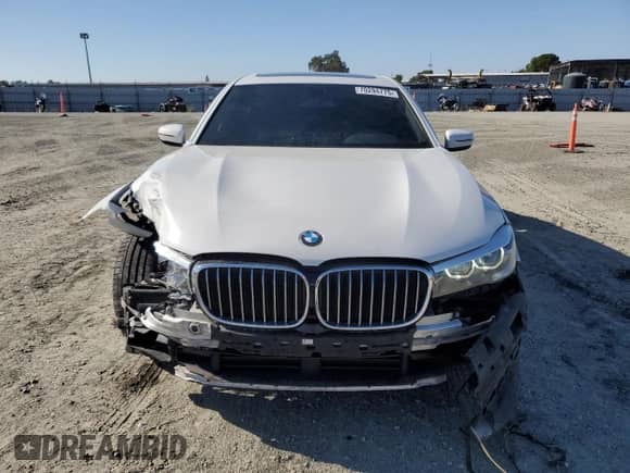 2018 BMW 7 Series 740i with VIN WBA7E2C55JG743312, listed as a Copart auction lot 70294775 with 98,385 mi miles and Salvage title. Bid and sale history available at DreamBid. Image 5.