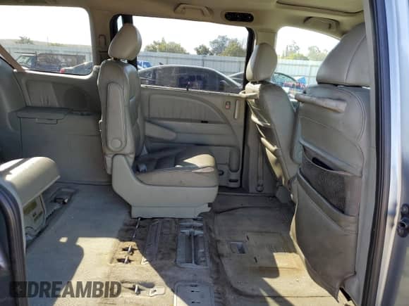 2007 Honda Odyssey EX-L с VIN 5FNRL38767B121645, выставлен на аукционе Copart как лот 87224365 с пробегом 167 747 миль миль и Списание • Salvage title. История ставок и продаж доступна на DreamBid. Изображение 11.