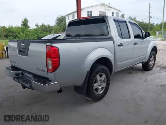 2005 Nissan Frontier Nismo with VIN 1N6AD07W35C446780, listed as a IAAI auction lot 43189679 with 138,461 mi miles and . Bid and sale history available at DreamBid. Image 4.