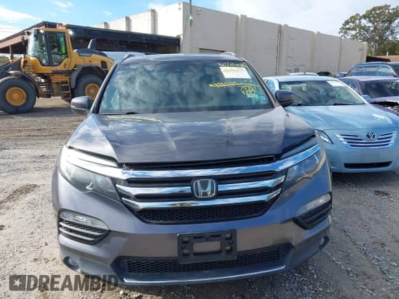 2018 Honda Pilot Elite z VIN 5FNYF6H06JB025867, wystawiony jako IAAI lot #43524597 z przebiegiem 94 479 mil mil oraz . Historia ofert i sprzedaży dostępna na DreamBid. Obrazek 12.