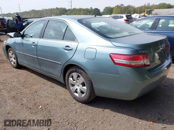 2010 Toyota Camry LE with VIN 4T1BF3EK0AU523365, listed as a IAAI auction lot 43285077 with 122,884 mi miles and . Bid and sale history available at DreamBid. Image 3.