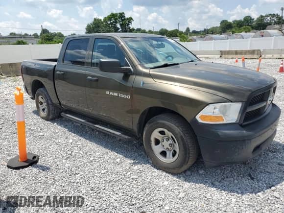 2012 Ram 1500 Tradesman with VIN 1C6RD7KP9CS254482, listed as a Copart auction lot 62598915 with 137,646 mi miles and Salvage title. Bid and sale history available at DreamBid. Image 4.
